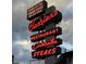 A nostalgic neon sign advertises 