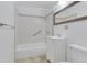 Bathroom featuring a shower-tub combo, vanity, and modern fixtures at 29090 Golf Way, Evergreen, CO 80439
