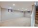 Finished basement with neutral carpet and recessed lighting at 6708 S Niagara Ct, Centennial, CO 80112