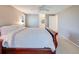 The bedroom has a plush carpet and a large window for natural light at 6708 S Niagara Ct, Centennial, CO 80112