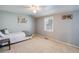 Cozy bedroom with a twin bed, natural light, and charming decor at 6708 S Niagara Ct, Centennial, CO 80112