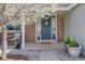 Charming entryway featuring a beautifully adorned front door with decorative wreath and sidelights at 6708 S Niagara Ct, Centennial, CO 80112