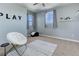 Light and airy bedroom with modern ceiling fan, stylish decor, and ample natural light at 8727 Hunters Hill Ln, Littleton, CO 80125