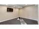 Versatile bonus room offers space for a home gym or recreation area with modern flooring at 8727 Hunters Hill Ln, Littleton, CO 80125