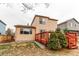 Cozy backyard featuring a wood deck and easy landscaping at 10652 Hyacinth St, Highlands Ranch, CO 80129