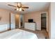 Bedroom featuring neutral walls, ceiling fan and carpeted floor at 10652 Hyacinth St, Highlands Ranch, CO 80129