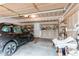 Spacious garage with shelving and organization solutions, ready for storage and projects at 10652 Hyacinth St, Highlands Ranch, CO 80129