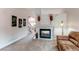 Bright living room with fireplace and neutral tones, perfect for relaxation at 10652 Hyacinth St, Highlands Ranch, CO 80129