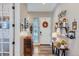 Inviting foyer with a console table, decorative accents, and beautiful wood flooring at 405 Buckskin Rd, Berthoud, CO 80513