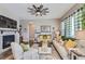 Comfortable living room featuring a fireplace, plush seating, and stylish accents at 405 Buckskin Rd, Berthoud, CO 80513