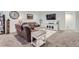 Spacious living room with comfortable seating, large TV, and stylish decor at 405 Buckskin Rd, Berthoud, CO 80513
