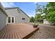 Backyard with wood deck and access to the yard at 904 Clover Cir, Lafayette, CO 80026