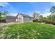 View of the backyard featuring grass and partial fencing at 904 Clover Cir, Lafayette, CO 80026