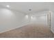 Finished basement with carpet flooring and neutral walls at 904 Clover Cir, Lafayette, CO 80026