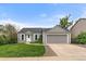 Single-Gathering home with a well-manicured lawn and an attached two-car garage in a lovely neighborhood at 904 Clover Cir, Lafayette, CO 80026