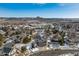 Aerial view showcasing the house's location in a neighborhood with mountain views at 1820 Cooper Ct, Castle Rock, CO 80109