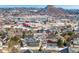 Wide aerial view of the house and surrounding neighborhood, showcasing mountain backdrop at 1820 Cooper Ct, Castle Rock, CO 80109