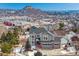 Aerial view of the property highlighting its neighborhood setting and mountain views at 1820 Cooper Ct, Castle Rock, CO 80109