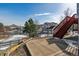 Exterior view of backyard with stairs leading to deck at 1820 Cooper Ct, Castle Rock, CO 80109