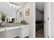 Bright bathroom with double vanity and large mirror at 1820 Cooper Ct, Castle Rock, CO 80109