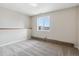 Well-lit bedroom with carpet and window at 1820 Cooper Ct, Castle Rock, CO 80109