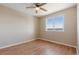 Spacious bedroom with a large window and hardwood floors at 1820 Cooper Ct, Castle Rock, CO 80109