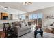 Open living room with a view, featuring hardwood floors and a comfortable couch at 1820 Cooper Ct, Castle Rock, CO 80109