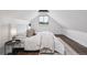Bright bedroom with pitched ceiling, window, wood floors, and designer touches at 1024 W 8Th Ave, Denver, CO 80204