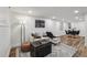 Comfortable living room with a cozy seating area and dining space at 1024 W 8Th Ave, Denver, CO 80204