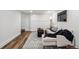 Bright living room with wood flooring, modern rug, and comfortable sectional couch at 1024 W 8Th Ave, Denver, CO 80204