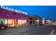 Street view featuring a pink museum ('Nada Que Cesa Museo') at night, displaying artistic flair at 1024 W 8Th Ave, Denver, CO 80204