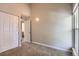 Clean bedroom with neutral walls, plush carpeting, and a doorway leading to the bathroom at 3539 S Fairplay Way # 10, Aurora, CO 80014
