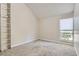 Well-lit bedroom with neutral carpet and a view at 3539 S Fairplay Way # 10, Aurora, CO 80014