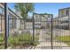 A gated community pool area with lounge chairs, offering residents a private retreat at 3539 S Fairplay Way # 10, Aurora, CO 80014