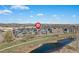 Stunning aerial view of the property by the river and walking path, with mountain views at 5026 S Platte River Pkwy, Littleton, CO 80123
