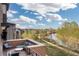 Relax on this beautiful patio with a brick railing and amazing views of the community and river walk at 5026 S Platte River Pkwy, Littleton, CO 80123