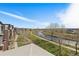 Scenic view of the river and walking path, showcasing the natural beauty surrounding the property at 5026 S Platte River Pkwy, Littleton, CO 80123