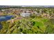 Modern condo complex near a park with winding paths, offering a blend of urban living and natural beauty at 3047 W 47Th Ave # 607, Denver, CO 80211