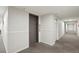 Hallway view of elevator and access to residential units at 3047 W 47Th Ave # 607, Denver, CO 80211