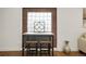 Kitchen showcasing the breakfast table by the brick and glass window at 3047 W 47Th Ave # 607, Denver, CO 80211