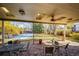 Back patio with brick flooring, outdoor seating, and view of the backyard at 6454 S Nelson Way, Littleton, CO 80127