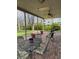 Covered patio with brick flooring, offering an inviting outdoor living space at 6454 S Nelson Way, Littleton, CO 80127