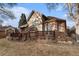 This home features a spacious back deck, perfect for outdoor entertaining at 7288 S Sundown Cir, Littleton, CO 80120