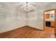 Dining area with hardwood floors and adjacent to kitchen at 7288 S Sundown Cir, Littleton, CO 80120