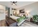 Inviting bedroom with a large bed, plush bedding, and stylish decor, creating a relaxing retreat at 4965 Dover St, Arvada, CO 80002