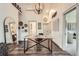Bright home office featuring hardwood floors, modern lighting, and ample space for a productive work environment at 4965 Dover St, Arvada, CO 80002