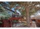 Multi-level backyard features wood deck, lower patio and partially fenced yard at 16873 Boreas Ct, Parker, CO 80134