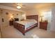 Bedroom features a comfortable bed with an adjacent desk and nightstand at 16873 Boreas Ct, Parker, CO 80134