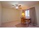 Bedroom featuring a cozy desk area with natural light from the window at 16873 Boreas Ct, Parker, CO 80134