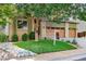 Charming two-story home with well-manicured lawn, mature tree, and inviting curb appeal at 16873 Boreas Ct, Parker, CO 80134